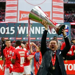 Champagne Moments: Steve Cotterill Lifts the Johnstones Paint Trophy after Bristol City's 2-0 Victory over Walsall