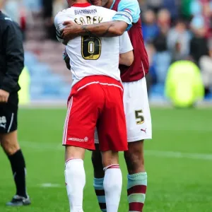 Championship Clash: Burnley and Bristol City Captains Embrace Victory at Turf Moor (August 2010) Championship Clash: Burnley and Bristol City Captains Embrace Victory at Turf Moor (August 2010)