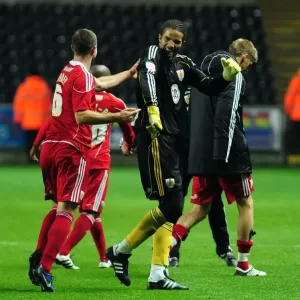 Championship Glory: David James and Louis Carey's Emotional Reunion after Bristol City's Victory over Swansea City (10/11/2010)