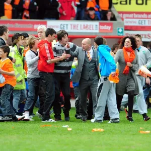 Championship Glory: Blackpool Fans Emotional Pitch Invasion as Ian Holloway Celebrates Title Win vs. Bristol City (02/05/2010)