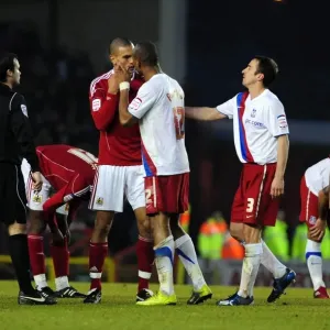 Championship Rivalry: Caulker vs. Andrews Clash at Ashton Gate, 2010