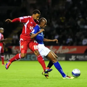 Championship Showdown: Maynard vs. Fernandes - Bristol City vs. Leicester City (06/08/2011) - Nicky Maynard vs. Gelson Fernandes Battle for Ball in Championship Clash Championship Showdown: Maynard vs. Fernandes - Bristol City vs. Leicester City (06/08/2011) - Nicky Maynard vs. Gelson Fernandes Battle for Ball in Championship Clash