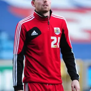 Championship Showdown: Paul Anderson of Bristol City Faces Off Against Millwall