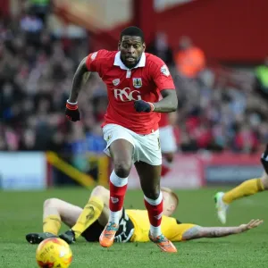 Chasing the Win: Intense Moment as Jay Emmanuel-Thomas of Bristol City Pursues Loose Ball Against Sheffield United