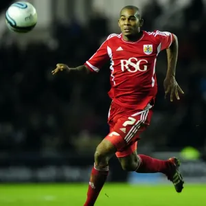 Chasing the Win: Marvin Elliott Pursues Loose Ball in Derby County vs. Bristol City Championship Match, 10/12/2011