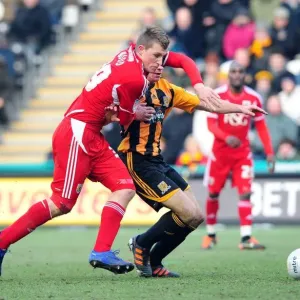 Chris Wood and James Chester in action at The KC Stadium