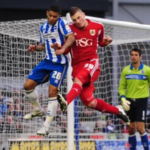 Chris Wood and Liam Bridcutt in mid-air