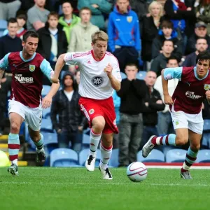 Christian Ribeiro's Late Rush: A Thrilling Moment from Burnley v Bristol City Championship Clash (2010) Christian Ribeiro's Late Rush: A Thrilling Moment from Burnley v Bristol City Championship Clash (2010)