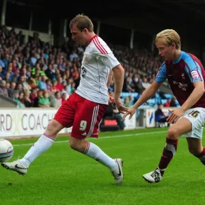 Print of Clash at Glanford Park Football Match