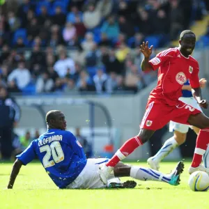 Clash of Titans: Olofinjana vs. Adomah in Intense Npower Championship Battle at Cardiff City Stadium (16/10/2010)