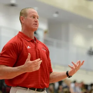 Print of Coach Kilmartin on the sidelines