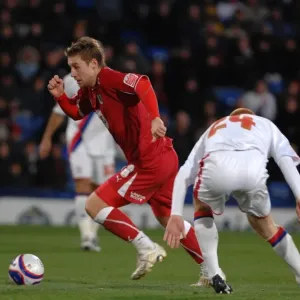 David Noble skips past Ben Watson David Noble skips past Ben Watson