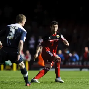 Decisive Moment: Foster's Pass Ignites Intense Npower Championship Clash between Bristol City and Huddersfield Town, April 2013