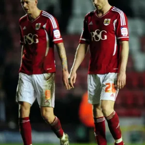 Dejected Duo: McManus and Stead Leave Ashton Gate After Bristol City's Loss to Watford Dejected Duo: McManus and Stead Leave Ashton Gate After Bristol City's Loss to Watford