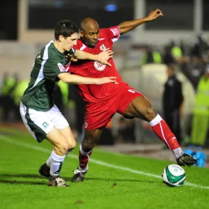 Dele Adebola battles with Craig Cathcart