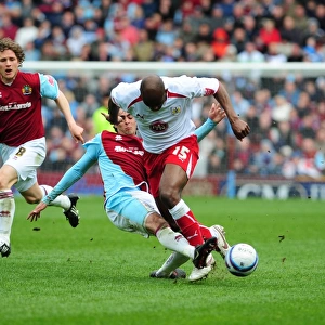 Dele Adebola is tackled by Rhys Williams