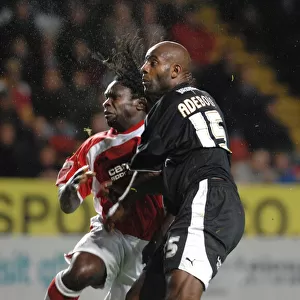 Dele Adebola tussles for the ball with Charltons Linvoy Primus