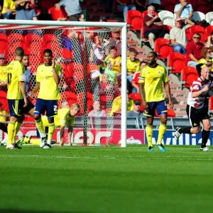 Print of Doncaster Rovers players celebrating a goal