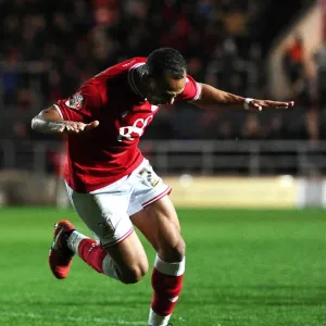 Print of Peter Odemwingie scoring for Bristol City against Rotherham United Print of Peter Odemwingie scoring for Bristol City against Rotherham United