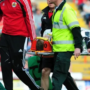 Print of Grant Leadbitter being stretchered from the pitch