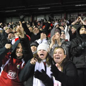 Ecstatic Bristol City Football Club Fans Celebrating a Goal