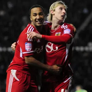 Euphoria at Pride Park: Woolford and Maynard's Goal Celebration for Bristol City in Derby County Championship Clash (10/12/2011)