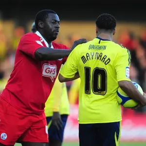 FA Cup: Pablo Mills of Crawley Town Holds Off Nicky Maynard of Bristol City