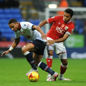 Feeney vs. Smith: Intense Battle for Possession in Bolton Wanderers vs. Bristol City Championship Clash Feeney vs. Smith: Intense Battle for Possession in Bolton Wanderers vs. Bristol City Championship Clash
