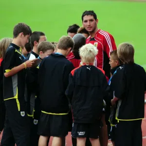 First team players sign autographs for the academy players First team players sign autographs for the academy players