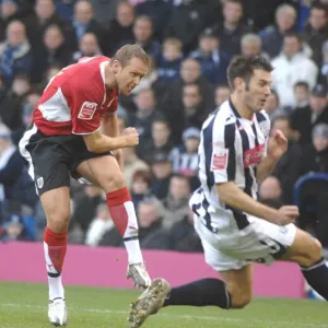 Football Rivalry: Lee Trundle Fights for Victory between West Brom and Bristol City