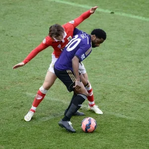 Football Rivalry Print: Alexandre Song shields the ball from Luke Freeman