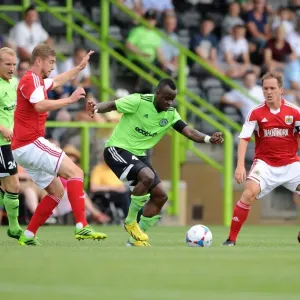 Forest Green Rovers Alhassan Bangura Outmaneuvers Bristol City's Steven Davis in Preseason Clash Forest Green Rovers Alhassan Bangura Outmaneuvers Bristol City's Steven Davis in Preseason Clash