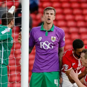 Frustration for Aden Flint as He Heads Wide: Barnsley vs. Bristol City, 2014 Frustration for Aden Flint as He Heads Wide: Barnsley vs. Bristol City, 2014