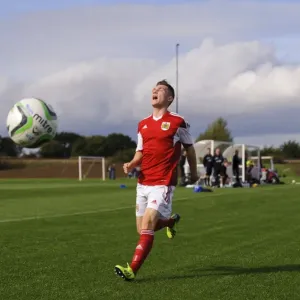 Frustration for Jamie Horgan: A Moment of Disappointment in the U18 Professional Development League Clash Between Bristol City and Brighton & Hove Albion