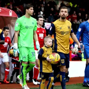 Gary O'Neil and Young Mascot Lead Bristol City Out at The City Ground Gary O'Neil and Young Mascot Lead Bristol City Out at The City Ground