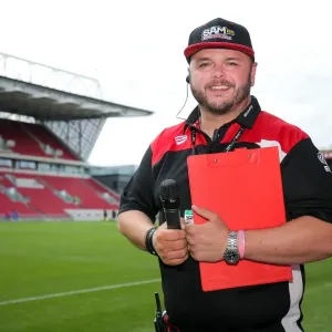 Half Time at Ashton Gate: Stadium Announcer Ian Downs Pauses Amidst Bristol City vs. Portsmouth Pre-Season Action