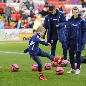 Half Time Fun: Children's Competition at Bristol City vs. Gillingham Football Match