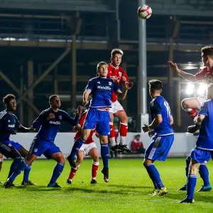 Print of Harvey Moss competing at a corner in the FA Youth Cup