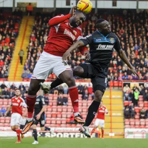 Intense Aerial Battle: Osborne vs Zoko in Sky Bet League One Clash Intense Aerial Battle: Osborne vs Zoko in Sky Bet League One Clash