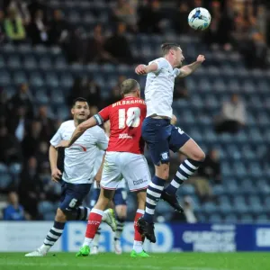 Intense Aerial Clash: Wilbraham vs. Huntington at Deepdale Stadium Intense Aerial Clash: Wilbraham vs. Huntington at Deepdale Stadium