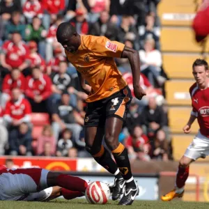 Intense Battle: Marvin Elliott Fights for Ball Against Wolverhampton Wanderers