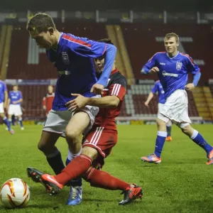 Intense Battle: Miles John of Bristol City U18s vs Ipswich Town U18 in FA Youth Cup Third Round Proper at Ashton Gate