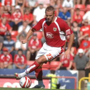 Intense Battle on the Soccer Field: Lee Trundle vs Scunthorpe United (Bristol City vs Scunthorpe Utd)