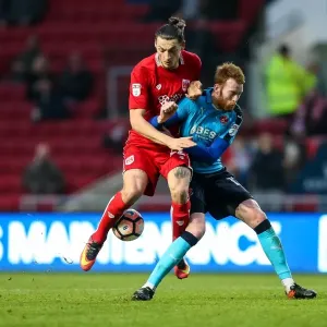 Intense Clash: Milan Djuric vs. Cian Bolger, FA Cup Third Round at Ashton Gate Intense Clash: Milan Djuric vs. Cian Bolger, FA Cup Third Round at Ashton Gate