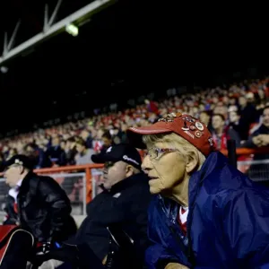 Intense Focus: A Bristol City Fan Caught in the Moment at Ashton Gate