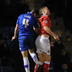 Print of intense football header clash at Priestfield Stadium Print of intense football header clash at Priestfield Stadium