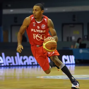 Print of a focused basketball player in action Print of a focused basketball player in action