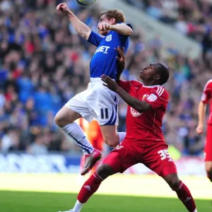Intense Moment: Burke vs. Rose in Npower Championship Clash at Cardiff City Stadium (16/10/2010)