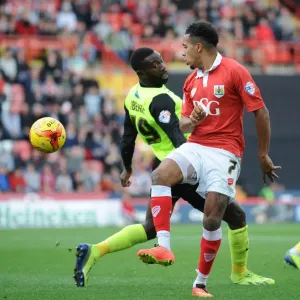 Intense Moment: Korey Smith vs. Jabo Ibehre in Bristol City's Battle against Oldham Athletic