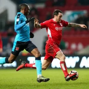 Intense Moment: Lee Tomlin vs Amari Bell - FA Cup Clash at Ashton Gate Intense Moment: Lee Tomlin vs Amari Bell - FA Cup Clash at Ashton Gate